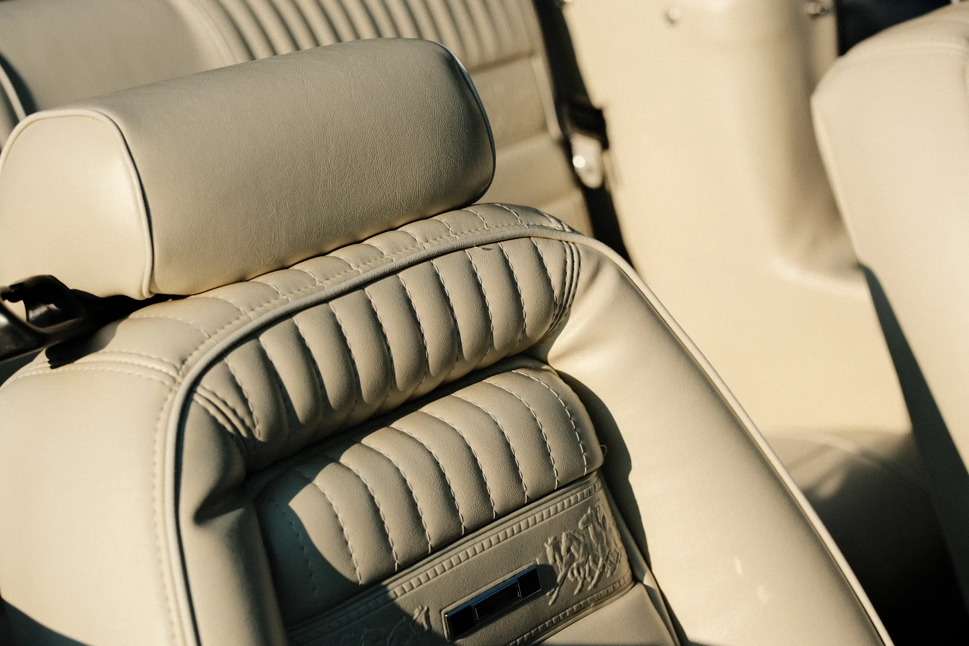 Cream leather seat detail with headrest