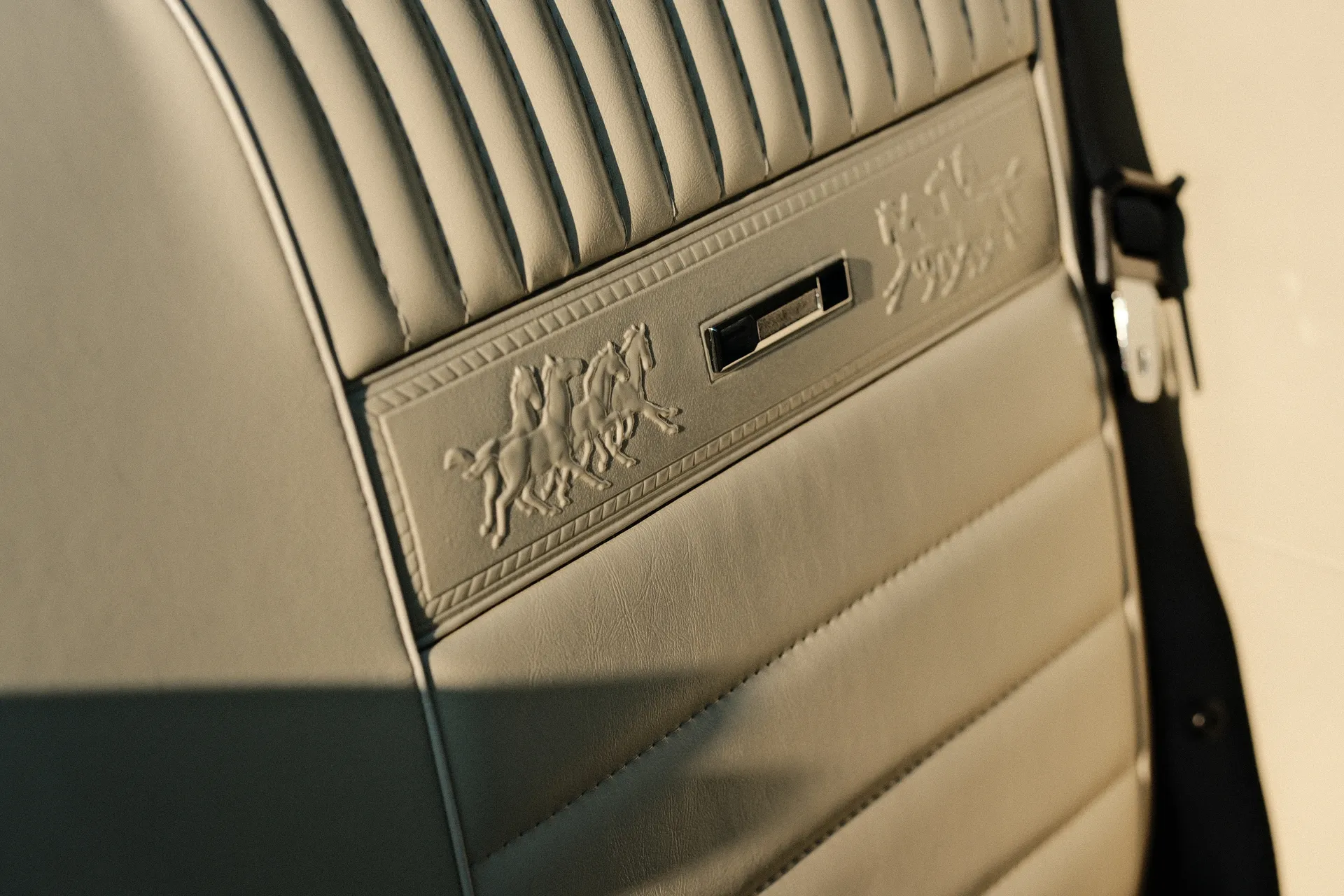 Running-horse emboss on the seat back